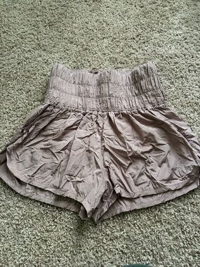 FP Movement by Free People High-Waist Smocked Waistband Shorts in Taupe